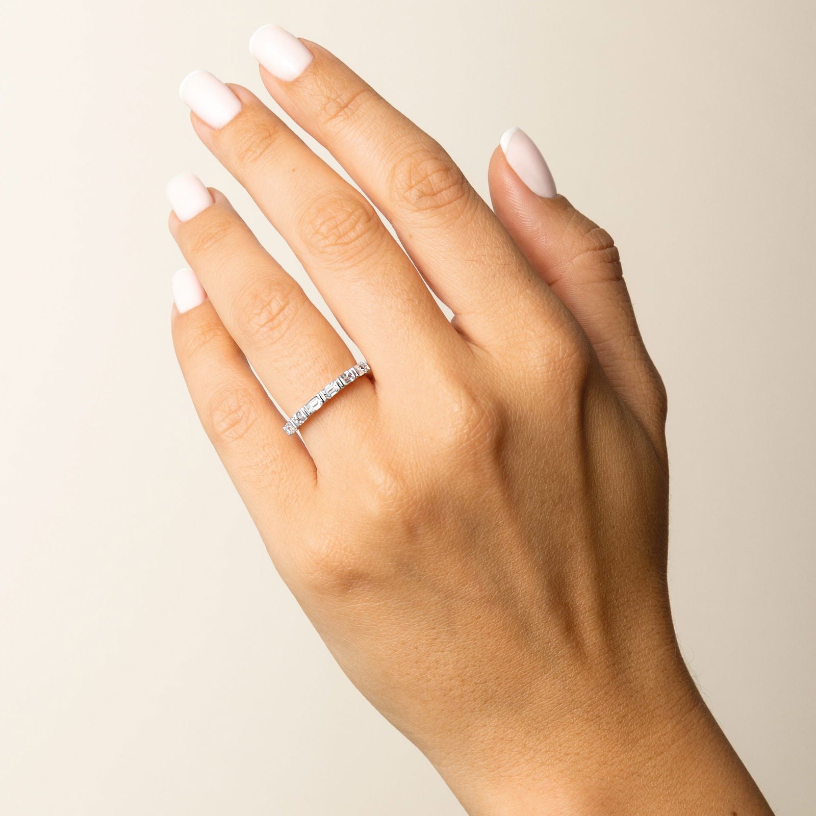 East to West Emerald Cut Diamond Ring