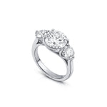 Tria Engagement Ring - Round Brilliant Three Stone Ring